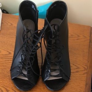 Laced up black wedges